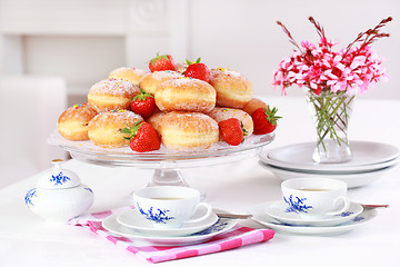 Image showing Berliner - doughnut filled with strawberry jam