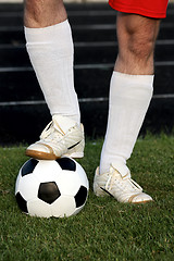 Image showing Legs with ball