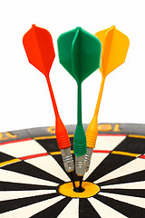 Image showing dartboard with darts in aim