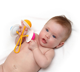 Image showing baby girl with rattle