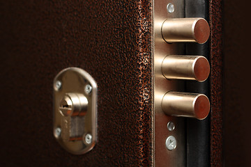 Image showing lock with pull out bolts close-up