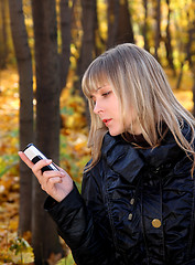 Image showing girl messaging with phone