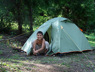 Image showing happy boy near camping tent