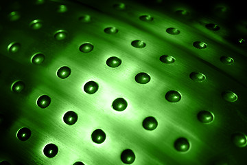 Image showing spherical metal green surface background with holes