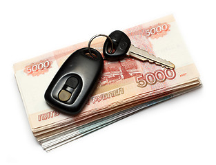 Image showing keys of second-hand car and money