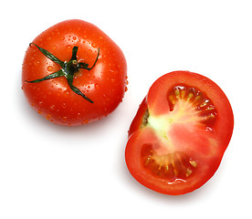 Image showing whole and section tomatoes