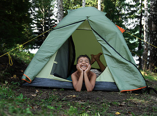 Image showing happy boy in camping tent