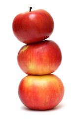 Image showing red apples pyramid on white