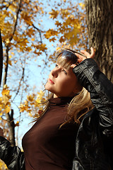 Image showing beautiful girl on autumn background