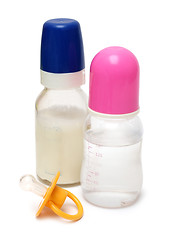 Image showing baby bottles with milk and water