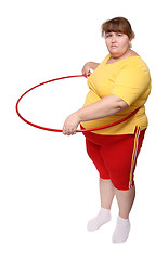 Image showing overweight woman exercising with hoop