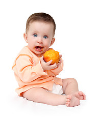 Image showing baby eating peach