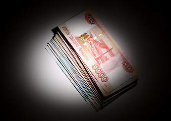 Image showing russian rubles in light spot