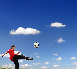 Image showing asian boy playing football