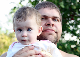 Image showing baby daughter and father