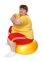 Image showing exercising overweight woman on ball