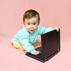 Image showing baby sitting with laptop