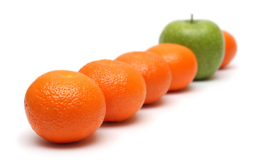 Image showing different concepts with mandarins and apple