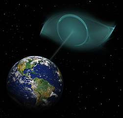 Image showing alien eye looking on earth planet