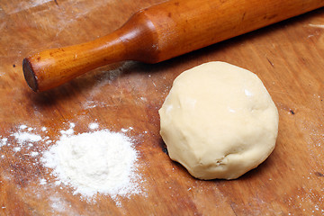 Image showing rolling-pin with pastry