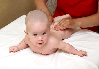 Image showing beauty small baby massaging