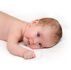 Image showing baby crawling on white sheet