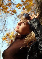 Image showing beautiful girl on autumn background