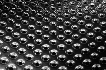 Image showing concave metal surface background with holes