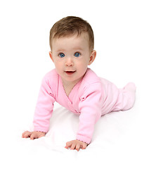 Image showing baby in pink on white sheet