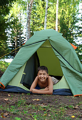 Image showing happy boy in camping tent