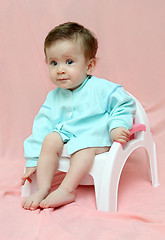 Image showing pretty baby sitting on chamber-pot