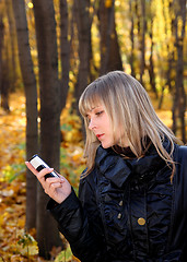 Image showing girl messaging with phone