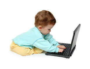 Image showing baby working on laptop