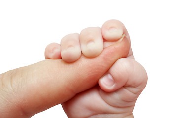 Image showing baby holding father finger