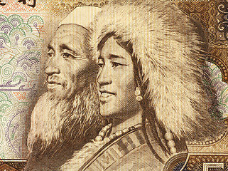 Image showing Old Tibetan Man and Young Islamic Woman