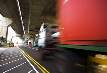 Image showing highway under the bridge and container car moving