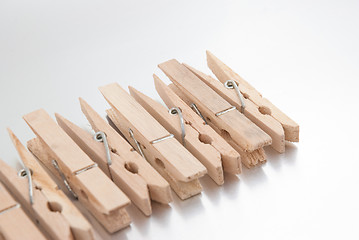 Image showing Wooden clothes pegs