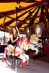 Image showing Girl having fun in amusement park