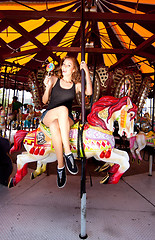 Image showing Girl having fun in amusement park