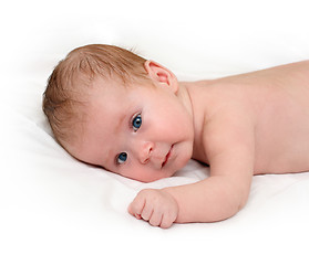 Image showing baby crawling on white sheet