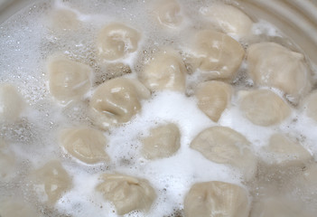 Image showing russian pelmeni boiling in pot