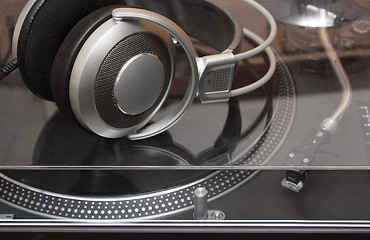 Image showing headphones on gramophone disc player