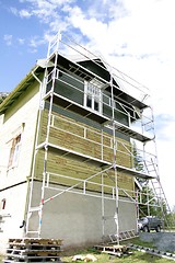 Image showing Old house getting new paint