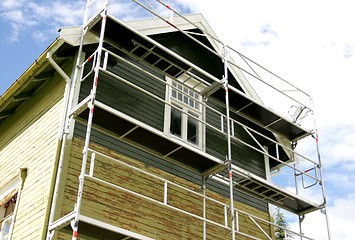 Image showing Old house getting new paint