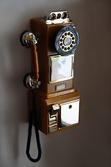 Image showing old telephone on wall