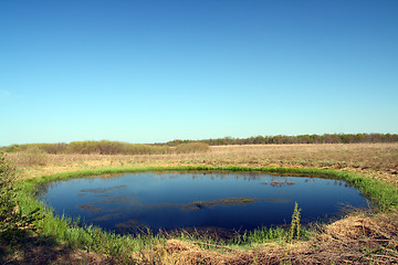 Image showing small round lake