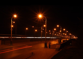 Image showing night road through bridge