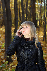 Image showing young woman talking by phone