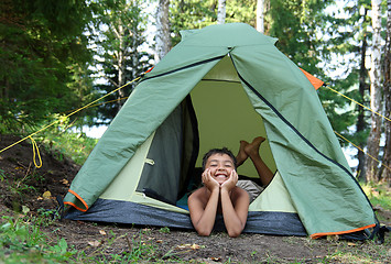 Image showing happy boy in camping tent