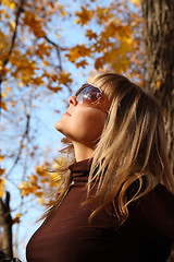 Image showing beautiful girl on autumn background